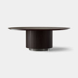 Coleccion Alexandra Tempo Pedestal Round Dining Table in midnight with antique nickel details and midnight ash top
