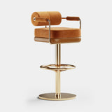 Mezzo Collection Anderson Bar Chair, Alhambra Jimena 08 and Designers Guild Matara Clove fabrics, polished brass, available from Touched Interiors UK