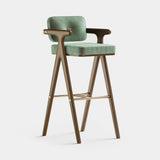 Mezzo Collection Bernard Bar Chair, Alhambra Jimena 03 fabric, matte walnut frame, polished brass, available from Touched Interiors UK