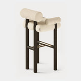Dolmen Conley Bar Chair in Designers Guild Riveau Snow FDG2443/32 fabric, black oak frame, aged brass details, fourth view