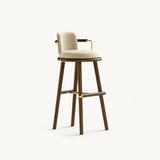 Mezzo Collection Darla Bar Chair, Alhambra Jimena 17 fabric, matte walnut frame, polished brass, available from Touched Interiors UK
