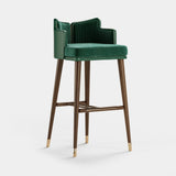 Mezzo Collection Ervin Bar Chair, Alhambra Jimena 83 and Panaz Aston 110 Pacific fabrics, matte walnut frame, polished brass, available from Touched Interiors UK