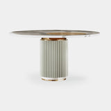 Mezzo Collection Mulligan Dining Table, Carrara marble top, glossy lacquered metal base and polished brass, available from Touched Interiors UK