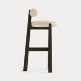 Dolmen Petra Bar Chair in Nobilis Timeo 10876-03 fabric, black oak frame, aged brass details, third view