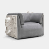 Boca do Lobo Versailles Armchair in grey velvet with sculpted stone-effect panels, available from Touched Interiors UK