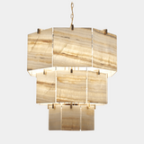 Visionnaire Brando Chandelier: Modern luxury chandelier featuring a captivating octagonal structure in metal with a choice of finishes. Delicate ivory onyx lampshades create a multifaceted effect, diffusing warm light and adding a touch of elegance to any space.