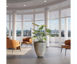 Ardesia Textured Stone Luxury Planter in grey, in a living space