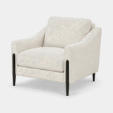 Berkeley Designs Siena Armchair, ivory textured upholstery with slim black metal legs, angled view