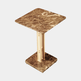 Castro Lighting Columns Side Table in polished brass with a marble top, available from Touched Interiors UK