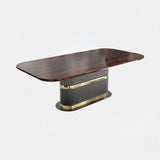 Castro Lighting Eléa Dining Table in polished brass with a marble top, available from Touched Interiors UK