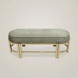 Castro Lighting Marie Oval Bench in fabric upholstery with a gold-plated brass frame, available from Touched Interiors UK