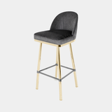Castro Lighting Penelope Bar Chair in leather upholstery with a gold-plated brass frame, available from Touched Interiors UK