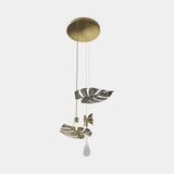 Castro Lighting Rainforest Pendant Light in gold-plated brass and black nickel with a crystal drop, available from Touched Interiors UK