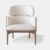 Celine Luxury Designer Armchair and Modern Curved Pouf styled in a luxury interior