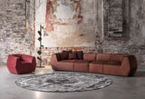 Cervaro Faceted Leather Luxury Sofa in a room setting
