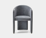 Daytona Mya Chair: Luxurious leather accent chair featuring a captivating blend of vintage modern design. The chair boasts soft curves and geometric details, all crafted from the finest Tuscan leather with beautiful satin brass accents.