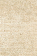 Thick and Fluffy Délice Hand-Woven Rug in Mastic, a soft warm beige