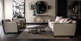 Diamond Stitched Luxury Italian Sofa with matching armchairs in a living room