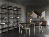Doria Slender Metal Base Luxury Dining Table in a room setting