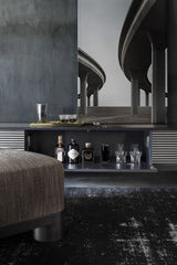 Dorsoduro Cylinder Foot Luxury Ottoman in a room setting