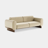 Mezzo Collection Leigh Sofa, Alhambra Jimena 06 fabric, matte walnut frame, polished brass, available from Touched Interiors UK