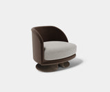 Curved Back Design: The Espresso Modern Embrace Armchair by Touched Interiors - Unwind in the luxurious comfort of the Espresso Modern Embrace Armchair by Touched Interiors. This captivating piece features a unique curved back design, inspired by the classic espresso cup, that cradles you in comfort. The sleek epoxy iron base with a bronze finish adds a touch of modern elegance. A perfect addition to any living space.