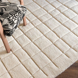 Hand-Knotted Grid Pattern Wool Rug, shown in a room setting