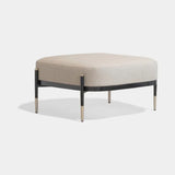 Harlow Floating Frame Luxury Pouf: ivory fabric (Cat B) on a black metal frame with metal tips
