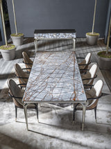 Elevate Your Living Space: The Jera Padded Chair Collection by Visionnaire. Choose from classic quilted velvet or the stunning Jera Radica with a briarwood backrest, both offering exceptional comfort and a touch of Italian craftsmanship.