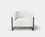 Madison: Minimalist Armchair with Epoxy Iron Bronze Base by Touched Interiors - Experience the epitome of minimalist luxury with the Madison Armchair by Touched Interiors. This captivating piece features soft, inviting upholstery and a sleek epoxy iron base with a stunning bronze finish. The Madison is the perfect statement piece for sophisticated living rooms or a tranquil retreat in your home.