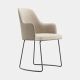 Domkapa Anna Sled Dining Chair with Armrests, view 3, in light beige fabric on a Black Texturized sled