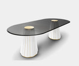 Contemporary oval dining table with walnut root, brass detailing, and smoked glass