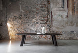 Nuraghe Splayed Leg Marble Luxury Dining Table in a room setting