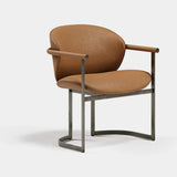 Primrose Sculpted Luxury Dining Chair: tan genuine leather (Cat B) on a metal frame