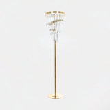 Castro Lighting Royal Floor Lamp in gold-plated brass with clear glass, available from Touched Interiors UK