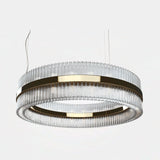 Castro Lighting Rolland Round Suspension Lamp in gold-plated brass with clear glass, available from Touched Interiors UK
