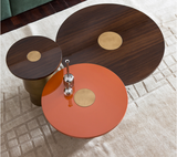 Ruolo nesting coffee tables in walnut and brass, seen from above