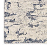 Sculptural Blue Wool Luxury Rug, available from Touched Interiors UK