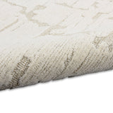 Sculptural Ivory Wool Luxury Rug, available from Touched Interiors UK
