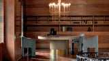 Siena curved dining chairs around a dining table in a wood panelled room