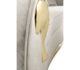 Boca Do Lobo's metalwork artistry shines in the Soleil Sofa. Polished brass accents complement the luxurious leather upholstery.