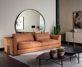 Tessuto Bronze Plate Luxury Sofa in a living room with round mirror