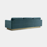 Touched D luxury sofa in teal velvet, rear three-quarter view of the satin brass base, 5 Seater (300cm)