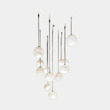 United Alabaster Rain Balls Pendant Light in natural alabaster spheres, studio view on grey