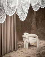 Comfortable Modern Armchair: The Shibari Armchair by Visionnaire combines innovative design with exceptional comfort. The teddy bear fabric and curved back provide ultimate relaxation.