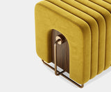 Modern Living Room Furniture with Geometric Design: The Deco Diamond Stool by Touched Interiors offers a captivating blend of mid-century modern inspiration and contemporary style. This versatile stool, crafted from walnut wood with a bold geometric pattern and brass detailing, complements a variety of design aesthetics.