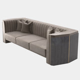 The Algerone Sofa: Transform your living room with this luxurious centerpiece. Rich velvet and brass accents exude opulence.