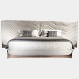 Visionnaire Ca' Foscari Bed: Modern luxury bed featuring a captivating quilted leather headboard with intricate embroidery inspired by Japanese art. This statement piece is perfect for the most glamorous master bedrooms.