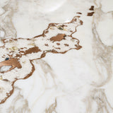 Elevate Your Dining Experience: The Galitsin Table. Visionnaire's masterpiece combines a luxurious marble top with a captivating artistic insert, transforming your dining room into a gallery-worthy space.