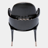 The Art of Modern Comfort: The Jera Padded Chair. Visionnaire's masterpiece combines a captivating organic shape with luxurious quilted velvet upholstery, a supportive interior padding, and a sleek lacquered metal handle, creating a statement piece for any living space.